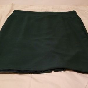 Hunter green, curve hugging skirt